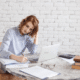 demo-attachment-472-woman-freelancer-female-hands-with-pen-writing-on-P369BAX1